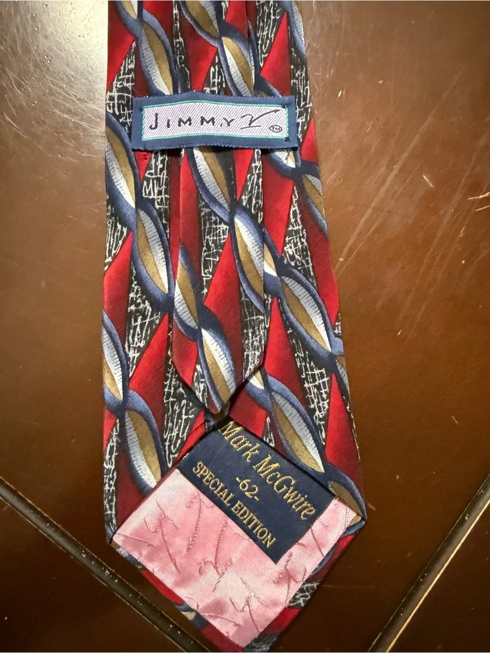 Men's Red Geometric Pattern Tie with Blue and Gold Accents